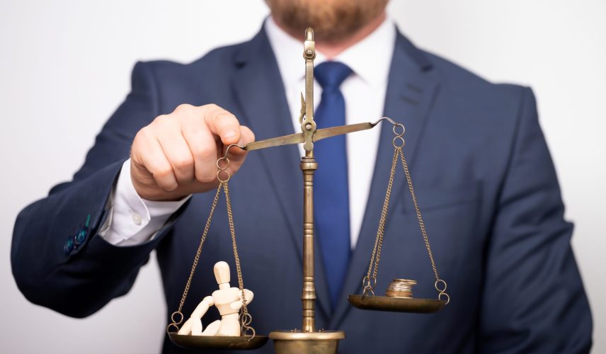 Conceptual financial and business photo of scale with people on one pan and money on the other showing balance
