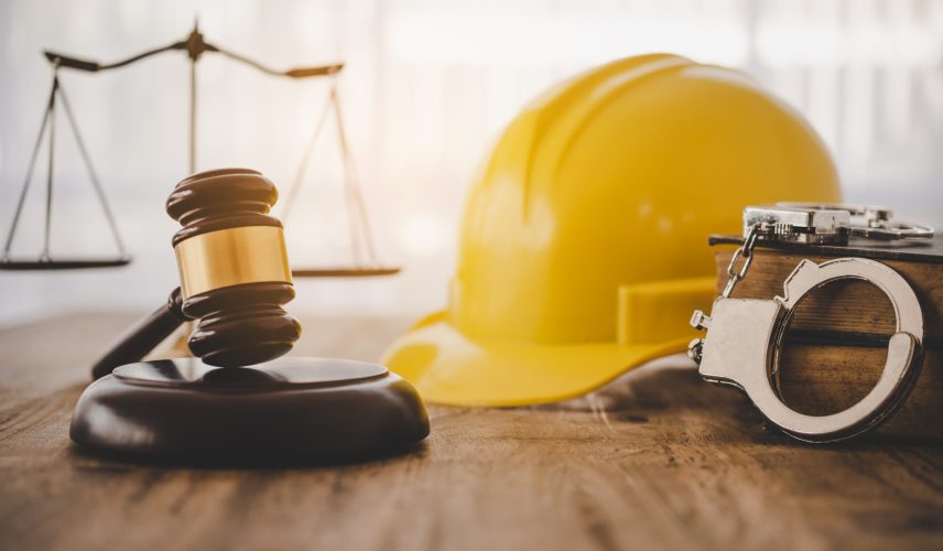 Judge's hammer and helmet Law and Justice about labor law concept Construction law.